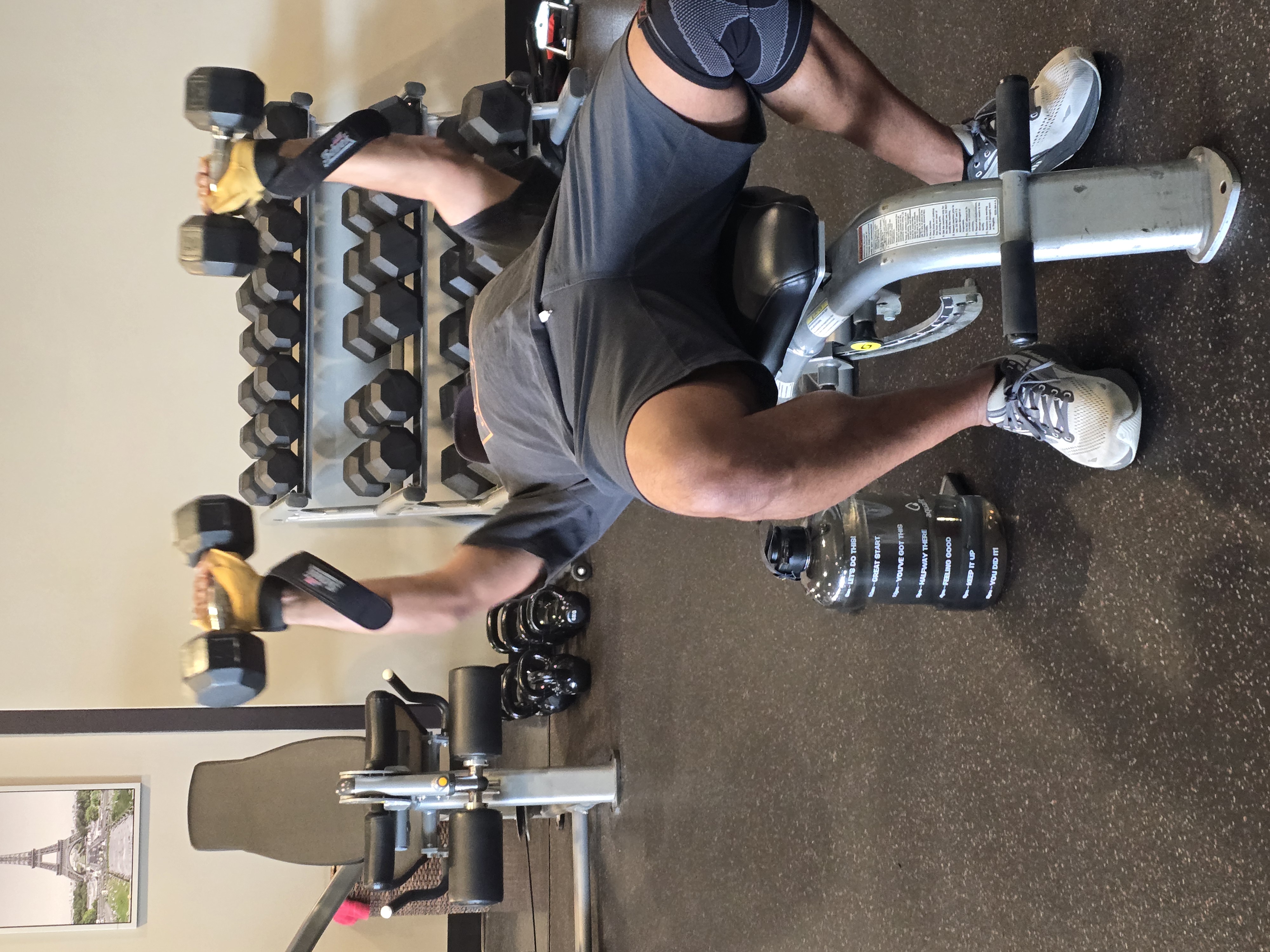 Training at Fit 2 Live — dumbbell press on the bench
